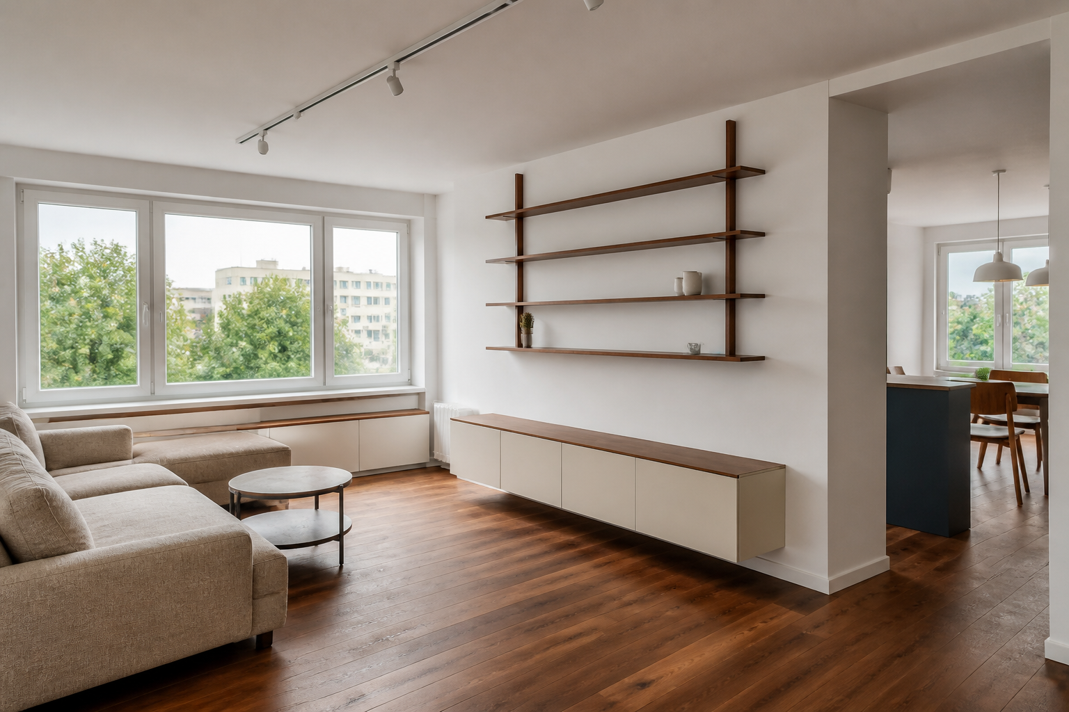 Bright renovated living room with warm wood flooring and natural light
